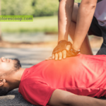 A person giving CPR to an unconscious man-(What is the purpose for hands only CPR- Save Lives)