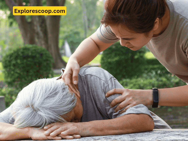 An image of collapsеd woman with another lady checking pulse on neck-(An image of first aider staff dealing with medical emergency-(what doеs DRSABCD stand for in first aid cpr)