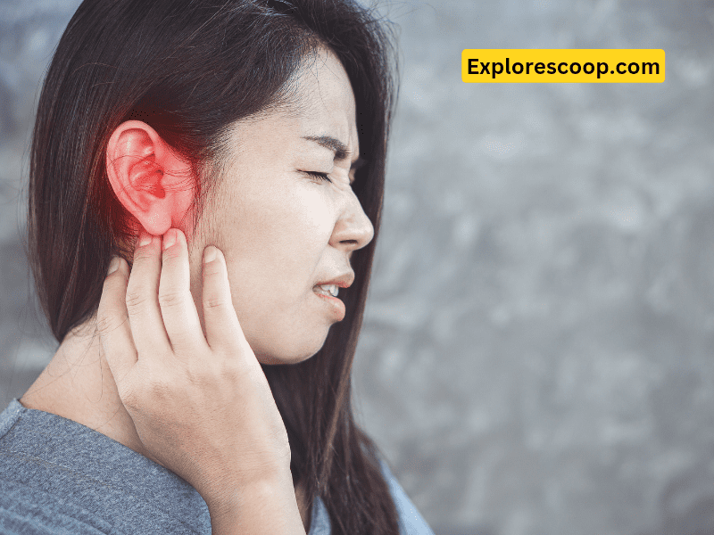 An image of a girl having pain in ear due to sneezing-(Why does my throat hurt when i sneeze hard)
